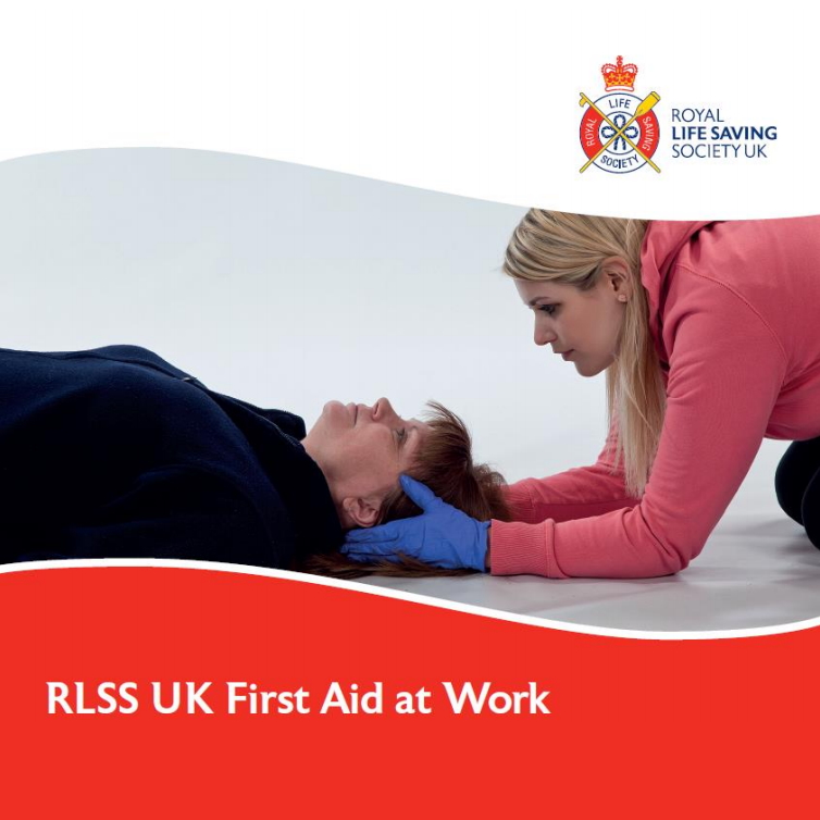 RLSS UK First Aid at Work - Female first aider supporting a female casualty head